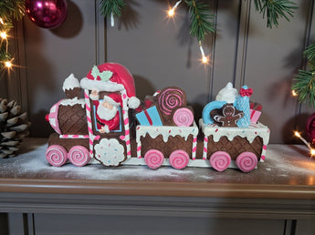 New Christmas Holiday Santa Clause Driving a Candy Cookie Waffle Train Figure