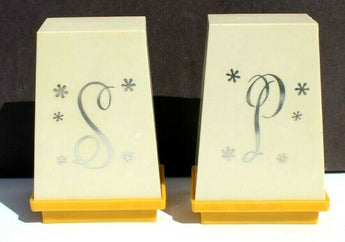 Vintage Mid Century Modern Mod Starburst Plastic Salt And Pepper Shakers Yellow