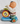 Vintage Baby Playing Drum & Cymbal On Scooter Wind-Up Tin Toy