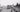 Vintage January 5, 1934 B&W Photo - Commercial Business Trucks Driving In Mud